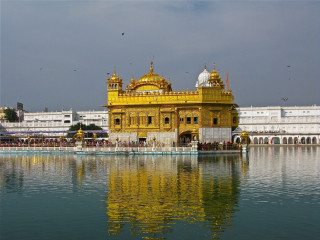 Large building yellow dome lake - a few person free wallpaper for desktop
