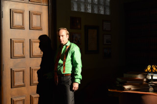 Man standing door green shirt - a door free wallpaper