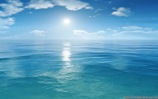 Bright sun ocean water blue 3 - a bright sun free wallpaper