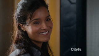 Woman smiling camera yellow wall - seductive smile free wallpaper for desktop