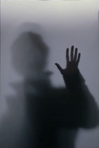 Person hand shadow wall behind - free halloween wallpaper for mobile