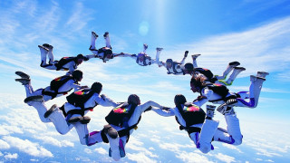 Flying people circle air arms - their foot free wallpaper