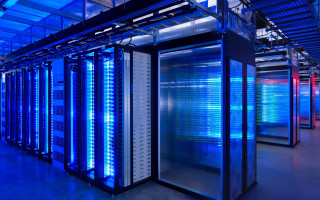 Large server room blue lights - center area free wallpaper