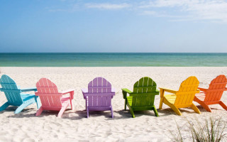 Colorful chairs sandy beach ocean 3 - a sandy beach next free wallpaper