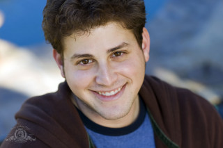 Man brown jacket smiling mountain - david lazar free wallpaper for desktop