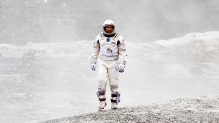 Man space suit hill snow - free space wallpaper