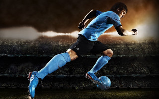 Soccer player kicking ball stadium 4 - alain tasso free wallpaper for desktop