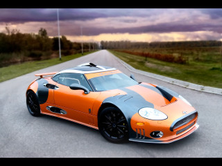 Sports car driving road sky - a sports car free wallpaper