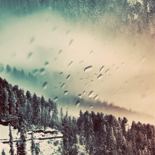 Snowy mountain trees rain drops - free winter wallpaper for tablet