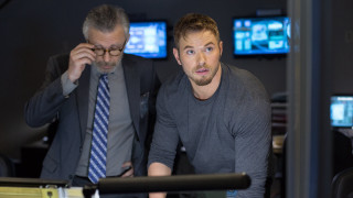 Man suit tie computer screen - another man in the background free wallpaper