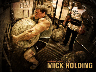 Man holding stone ball gym - colin middleton free wallpaper