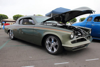 Green car hood open parking - a green car free wallpaper for desktop