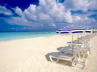 Beach white chairs umbrella blue 2 - a row free wallpaper
