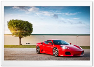 Red sports car tree building - vivid free wallpaper for desktop