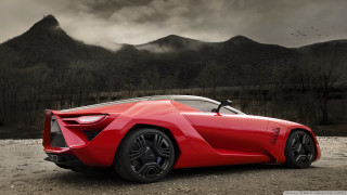 Red sports car mountain range 5 - a dark cloud in the sky free wallpaper