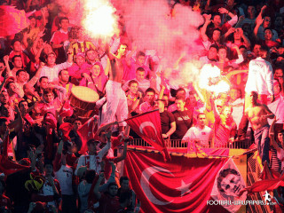 Crowd soccer match flares man - a crowd of people watching free wallpaper