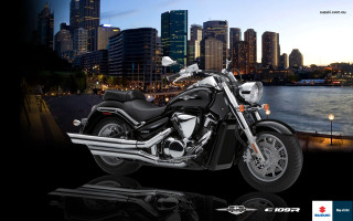 Motorcycle city skyline night reflection - a city skyline free wallpaper