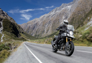 Man motorcycle curvy road mountains - his head free wallpaper