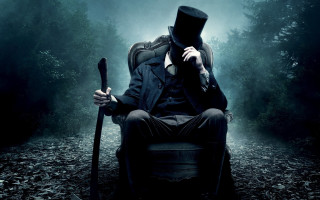 Man top hat coat sitting 4 - dark shadow free wallpaper