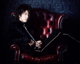 Man sitting red chair sword - magazine free wallpaper for desktop