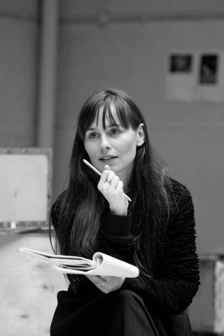 Woman sitting ground toothbrush clipboard - studio portrait free wallpaper for mobile