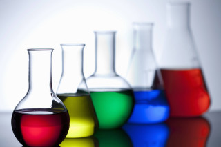 Colorful flasks reflection table top - a row free wallpaper