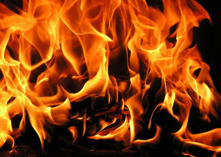 Close up fire flames ground - flame free wallpaper