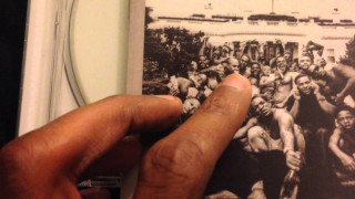 Hand holding picture group men - black arts movement free wallpaper