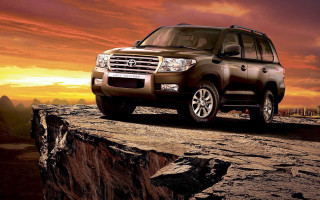 Brown suv rocky cliff sunset - ahmed yacoubi free wallpaper