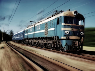 Blue train traveling tracks forest - track next free wallpaper