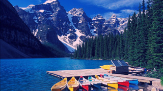 Dock canoes mountain range snow - the top of the mountains free wallpaper for desktop