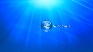 Blue background windows7 logo sunlight - the window 7 logo free wallpaper for desktop