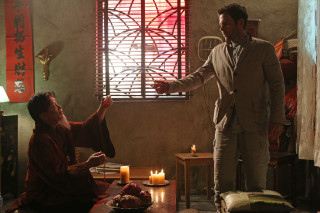 Man woman living room window - promotional free wallpaper for desktop