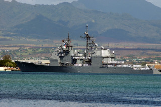 Battleship water mountain town foreground - a mountain range in the background free wallpaper