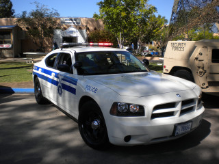 Police car parking lot truck - a parking lot next free wallpaper for desktop
