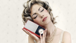 Woman holding clock necklace portrait - her neck and a necklace free wallpaper