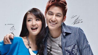 Man woman posing picture white - the wall behind them free wallpaper