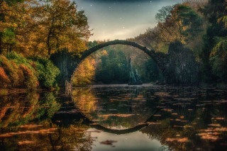 Bridge water trees foliage nighttime - a bridge over a body of water free wallpaper for desktop