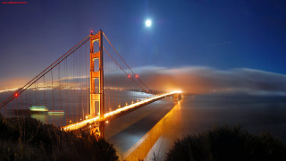 Foggy night golden gate bridge 2 - a full moon in the distance free wallpaper for desktop