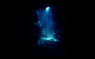 Waterfall dark cave blue light - a waterfall in the middle free wallpaper