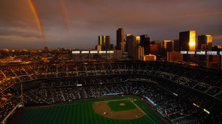 Baseball field rainbow skyline night - a city skyline in the background free wallpaper