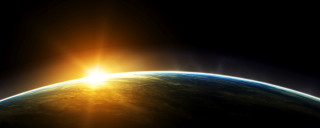 Sun shining earth space view - over the earth free wallpaper