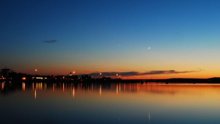 Water city night crescent moon - a crescent moon in the sky free wallpaper