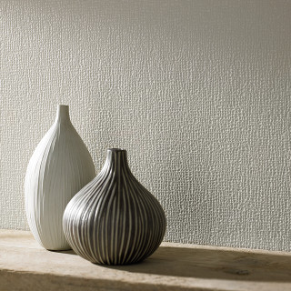 Two white vases on ledge - a white wall behind them free wallpaper
