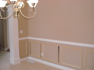Chandelier beige wall white trim - a wall in a room free wallpaper