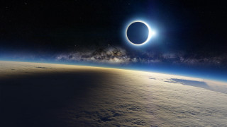 Solar eclipse earth horizon clouds - a solar eclipse free wallpaper