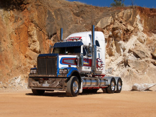Semi truck rocky cliff mountain - free motorcycles wallpaper for desktop