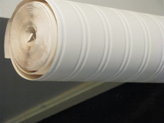 White paper roll hanging wall - mesh wire free wallpaper