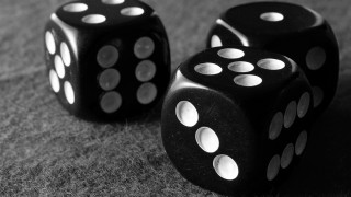 Black dices on table next - a couple free wallpaper