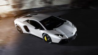 White sports car driving street 2 - rim free wallpaper